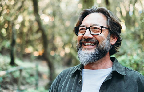 Man smiling outside