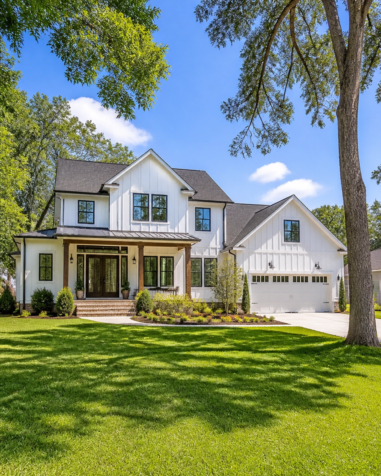 a beautiful house with a spacious lawn.